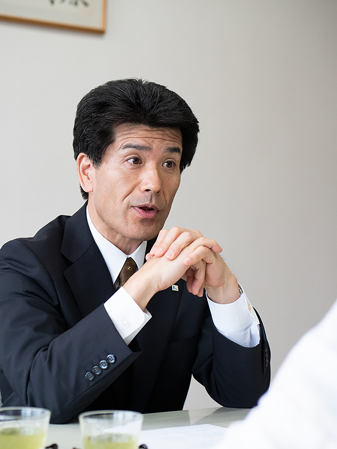 啓新高校（福井市）の理事長兼校長の荻原昭人さん